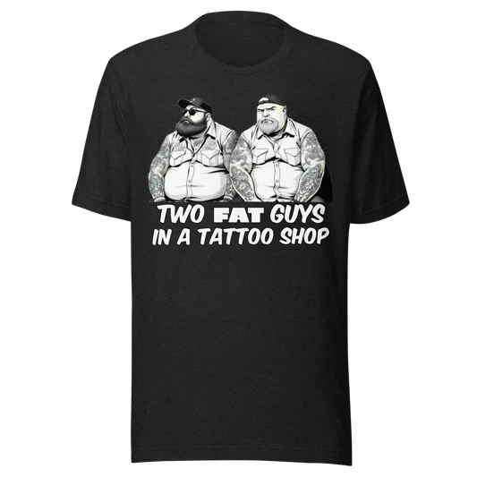 Black t-shirt with a graphic print of two fat guys in a tattoo shop on the front and a chubby pin-up on the back.